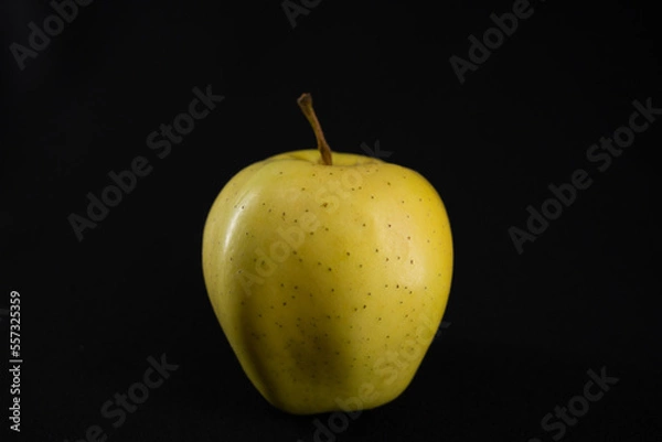 Obraz yellow apple on a dark background
