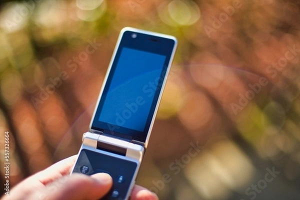 Obraz 手で持ったガラケー