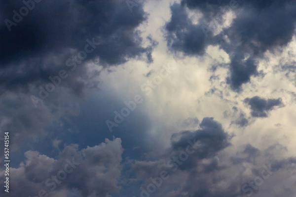 Fototapeta Closeup of dramatic sky with heavy black clouds