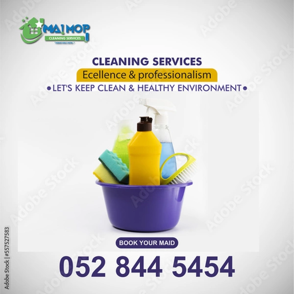 Fototapeta Cleaning service with professional equipment during work An employee of a professional cleaning service in overalls washes the glass of the windows of the facade of the building.