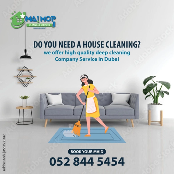 Fototapeta Cleaning service with professional equipment during work An employee of a professional cleaning service in overalls washes the glass of the windows of the facade of the building.