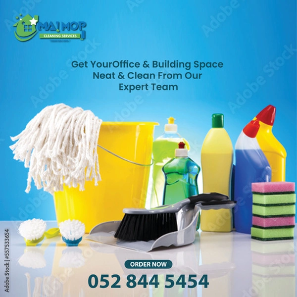 Fototapeta Cleaning service with professional equipment during work An employee of a professional cleaning service in overalls washes the glass of the windows of the facade of the building.