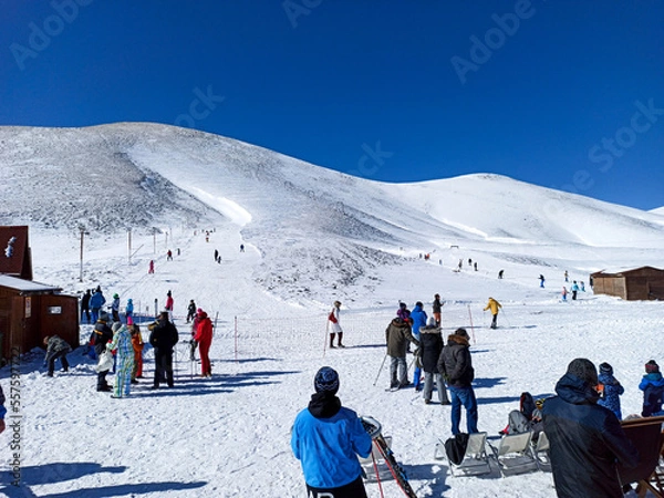 Obraz skiers on resort of Falakro mountain, full of snow in Drama city of North Greece