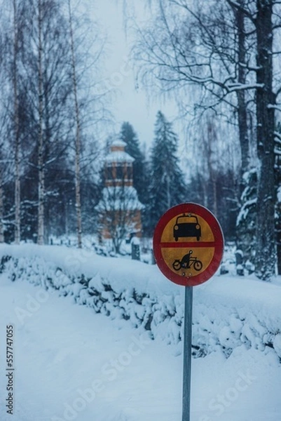 Fototapeta sign in snow with church in background