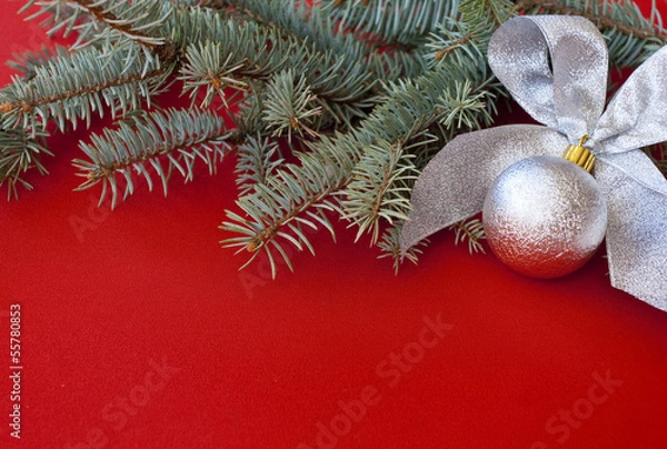 Obraz Silver New Year's decoration on red background