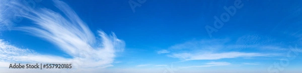 Fototapeta Blue Sky background with tiny Clouds. Panorama background