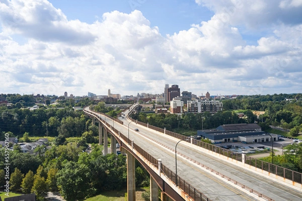 Fototapeta Akron, Ohio/USA - September 8th 2021: The All American bridge leading into Akron. Its a sunny day in sumer.