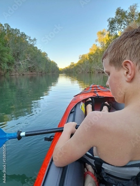 Obraz boy kayaking on the lake