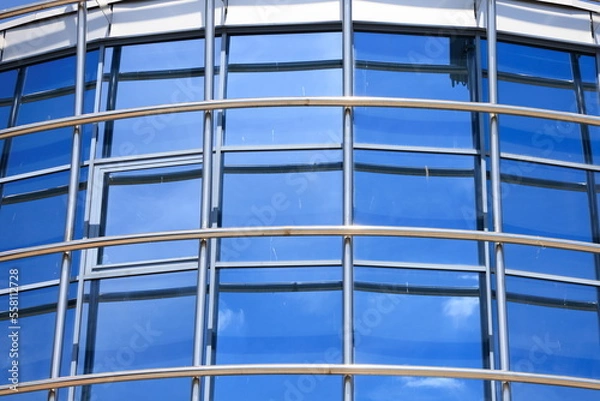 Fototapeta windows and metal structure on the wall of modern buildings of business centers. Background for design, texture modern