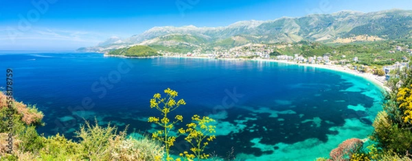 Fototapeta amazing blue bay in Himare in Albania