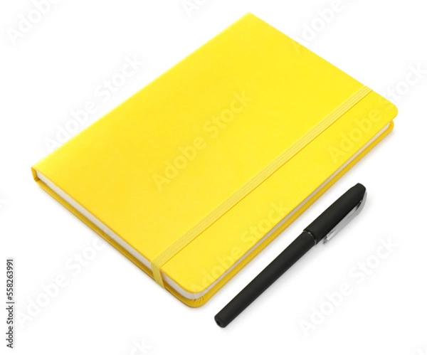 Fototapeta Closed yellow notebook with pen isolated on white