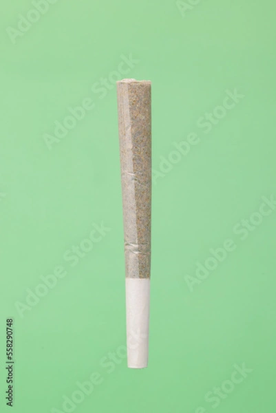 Obraz Preroll Joint on a teal background