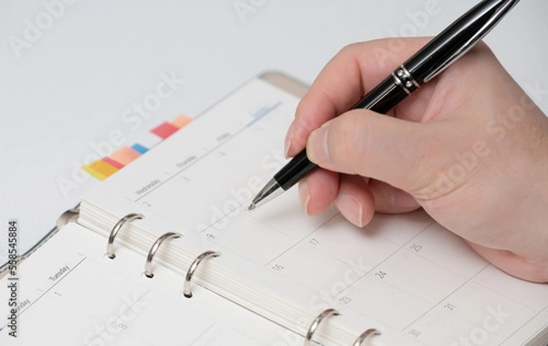 Fototapeta 다이어리를 작성하는 비즈니스맨