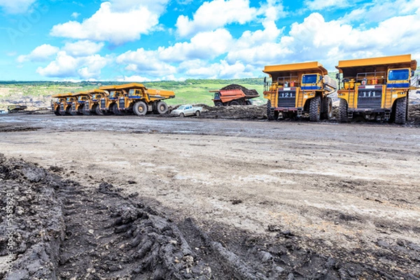 Obraz big truck in open pit and blue sky