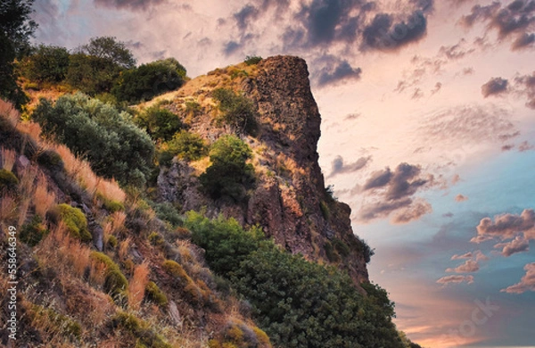 Obraz Clouds and sunset view from the top of a mountain with various dwarf Mediterranean scrub plants