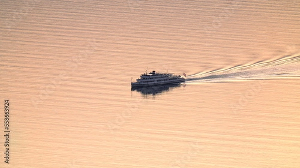 Fototapeta Ship on Lake Constance in sunset
