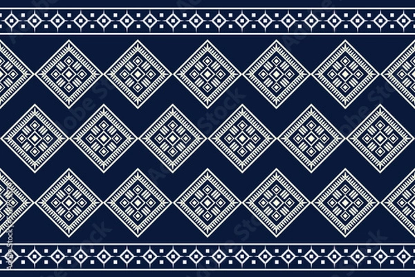 Fototapeta Ethnic fabric pattern geometric style. Sarong Aztec Ethnic oriental pattern traditional Dark navy blue background. Abstract,vector,illustration. Use for texture,clothing,wrapping,decoration,carpet.