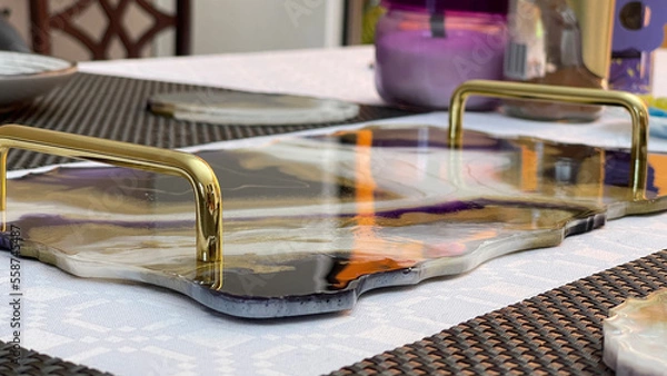 Fototapeta Tight shot of a set table with a beautiful tray