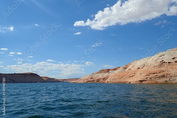Fototapeta Colorful sandstone rock formations along the Colorado River at Glen Canyon National Recreation Area
