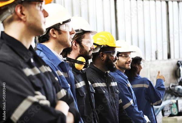 Fototapeta engineer team standing at industry