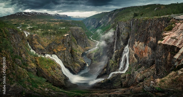 Fototapeta Landscape panorama of Voringsfossen waterfall in a valley at Hardangervidda National Park from above in Norway