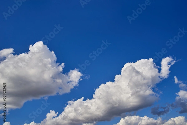 Obraz Sunny sky. Cloudscape Background. Close up of clouds