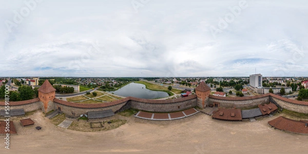 Fototapeta aerial full seamless spherical hdri 360 panorama view above over a medieval castle  and historic buildings in equirectangular projection.