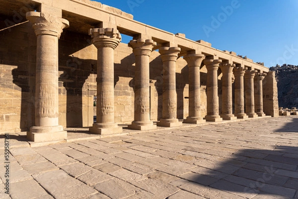 Obraz Columns of the Philae temple full of hieroglyphs.