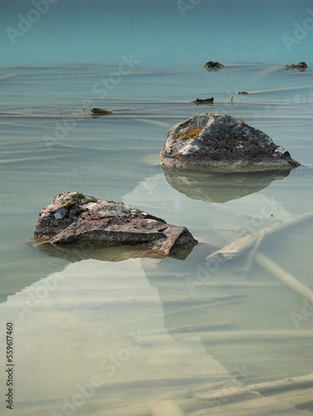 Fototapeta Rock in lake