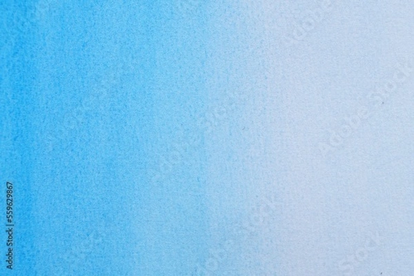 Fototapeta Abstract light blue watercolor painting as background, top view