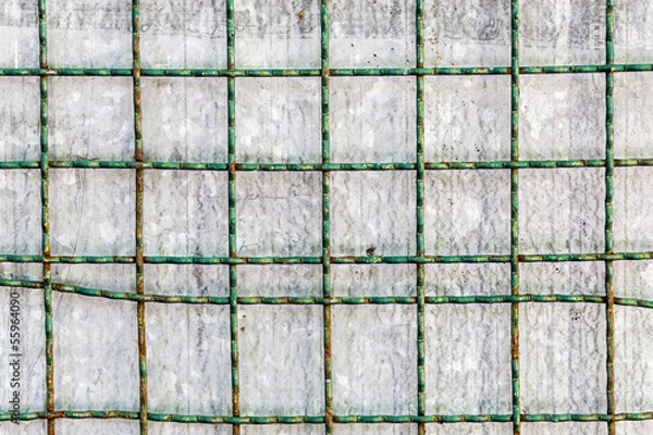 Obraz metal grid with metallic surface in background