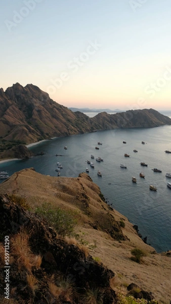 Fototapeta sunrise in Padar Island with ocean view