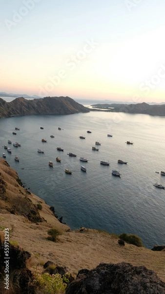 Fototapeta sunrise in Padar Island with ocean view
