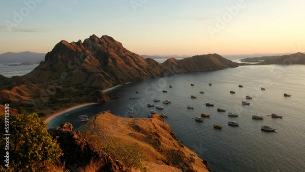 Fototapeta sunrise in Padar Island with ocean view