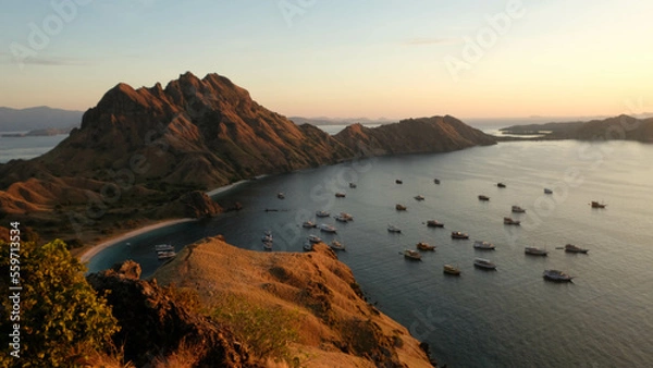 Fototapeta sunrise in Padar Island with ocean view