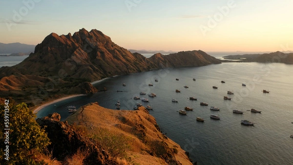 Fototapeta sunrise in Padar Island with ocean view