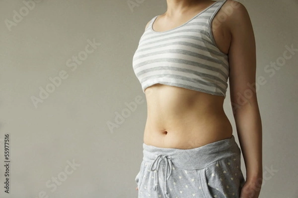 Fototapeta 女性のお腹