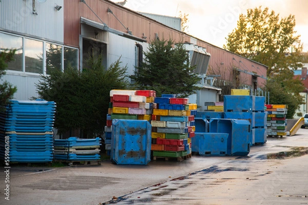 Fototapeta The fish factory has stopped working. Crisis in the fish industry. Empty fish boxes.