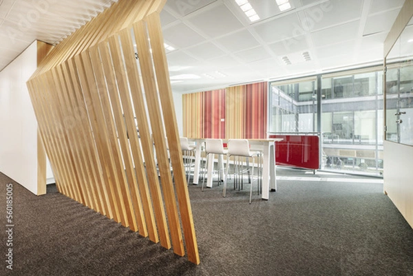 Fototapeta High dining table with white and chrome metal stools with views through a large window and oak lattice