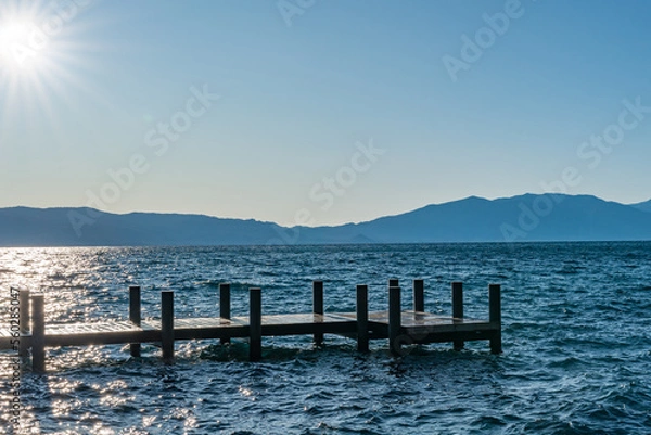 Obraz Sugar Pine Beach Park in South Lake Tahoe, California with Piers, Blue Lake, Sand, Water, Greenery and room for text.