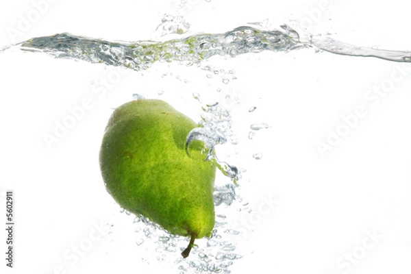 Fototapeta An image of pear falling in water