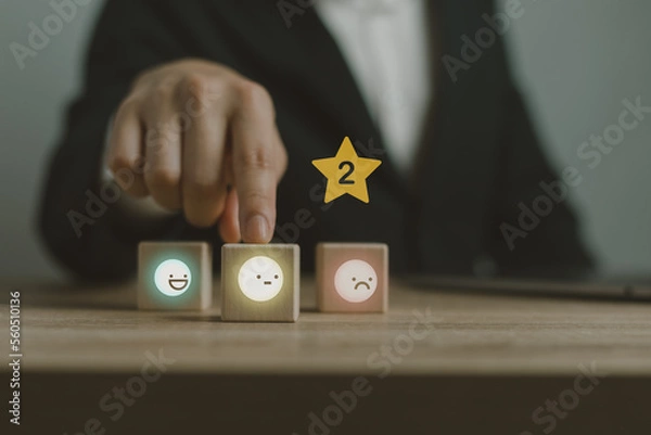 Obraz Businessman using thin line customer satisfaction rating.