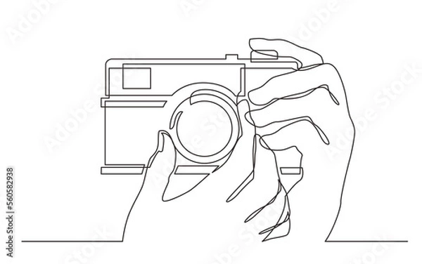Fototapeta continuous line drawing hand holding photo camera making pictures - PNG image with transparent background