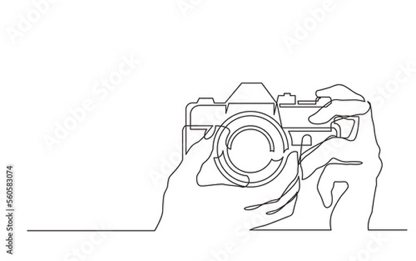 Fototapeta continuous line drawing hands holding photo camera - PNG image with transparent background