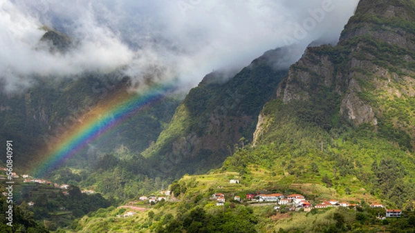 Obraz Tropical landscape with rainbow and clouds