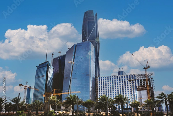 Fototapeta Riyadh, Saudi Arabia, KSA - December 02, 2017 new buildings being constructed in the new King Abdullah Financial District in Riyadh with clouds 