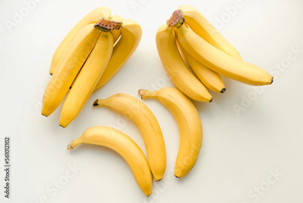 Fototapeta Bananas on a white background. Bunch of bananas. Ripe bananas.