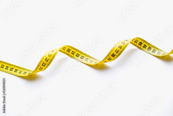 Fototapeta Yellow measuring tape. Measuring tape.