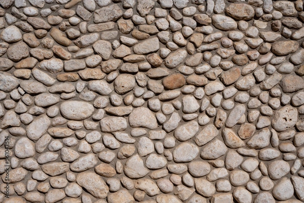 Fototapeta round stone wall background