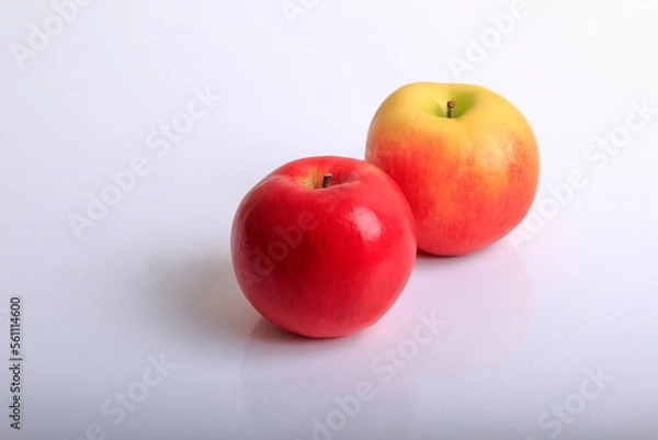 Fototapeta Composition of a pair of red apples.